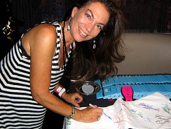 hillary atkin signing wizard jeans for charity.jpg